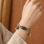 Song Yne Nine-Eyed Dzi Bead Wealth Protection Bracelet